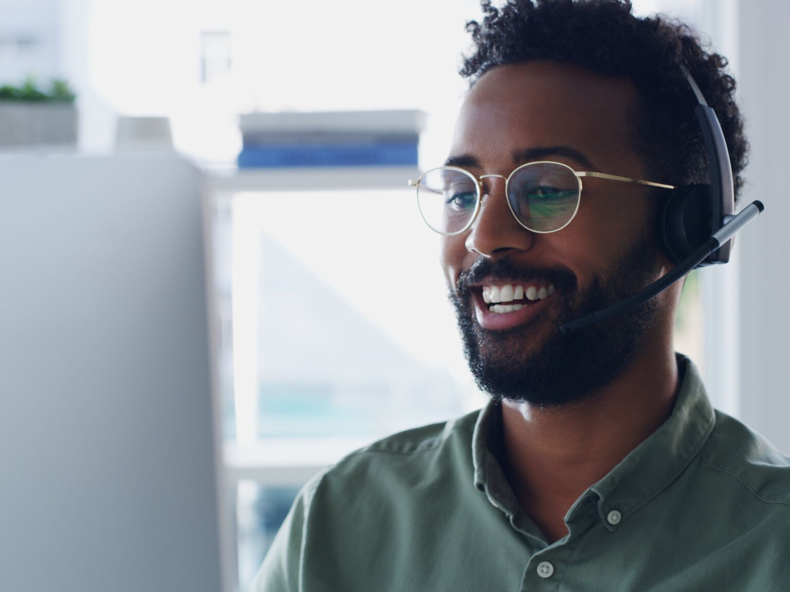a work professional speaking on headset a work professional speaking on headset